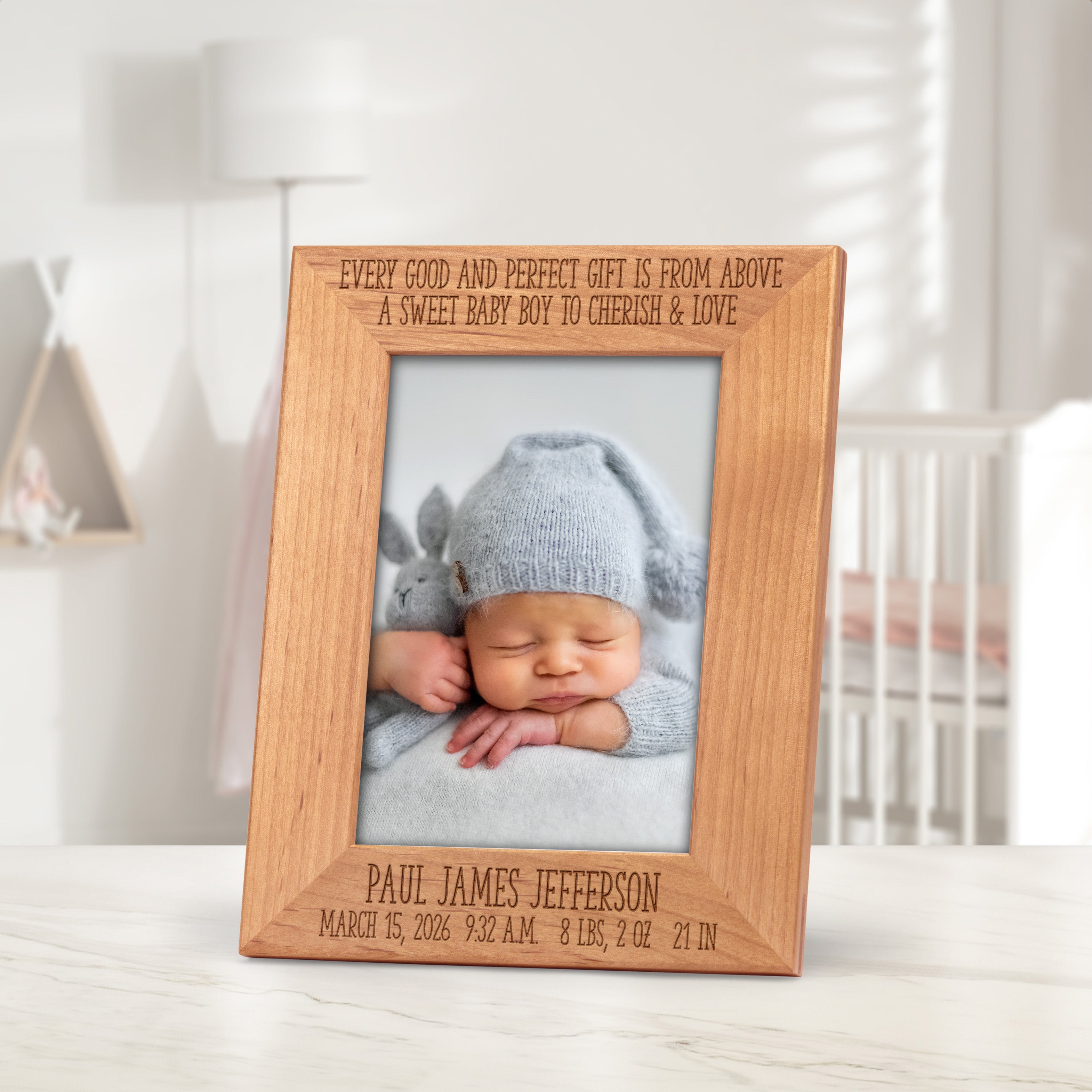 Newborn picture frame engraved with birth statistics.
