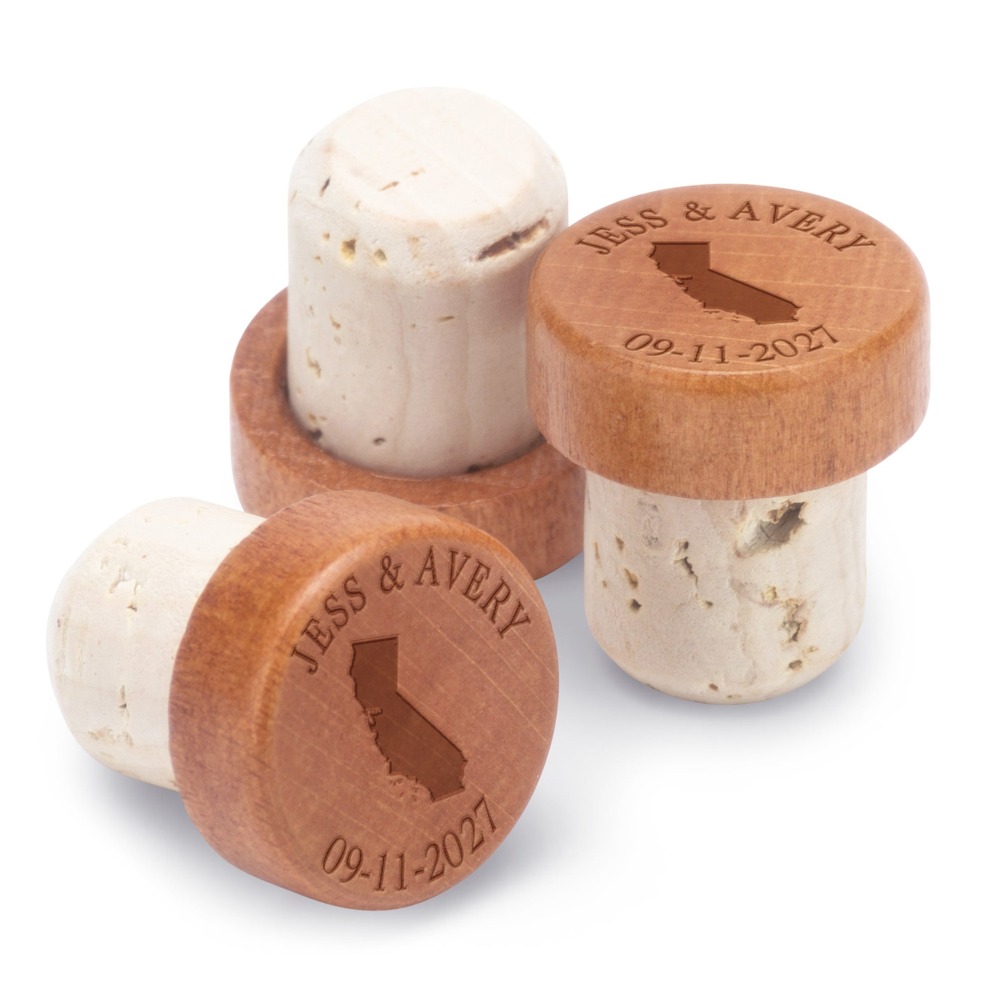 Wooden wine bottle stoppers engraved with a shape of California and personalized with names and date.