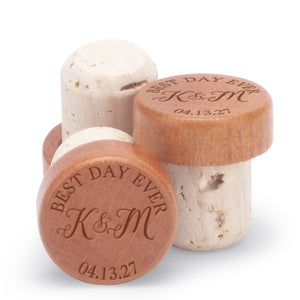 "Best Day Ever" personalized bottle stoppers engraved with couple's initials and a custom date.