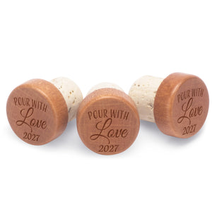 Pour with love engraved wine stopper favors with a custom date. 