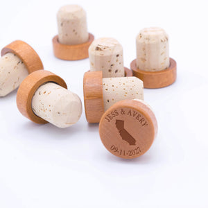 Custom champagne stoppers personalized with couple's names and custom date.