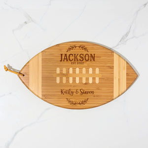 wedding-couple-cutting-board-football-shaped