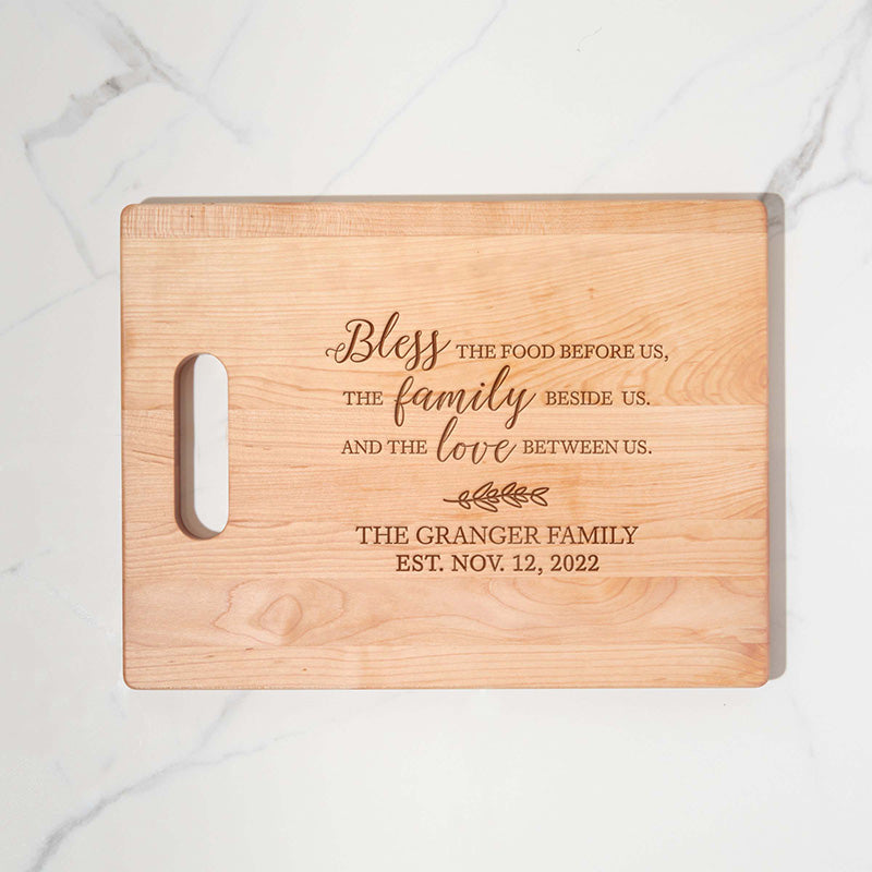https://www.personalizedgallery.com/cdn/shop/products/Engraved-maple-cutting-board-BLESS-FOOD-11_2048x.jpg?v=1649887158