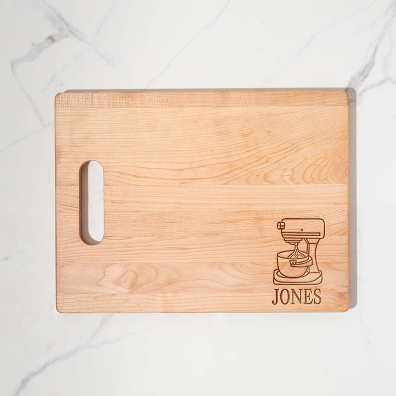 https://www.personalizedgallery.com/cdn/shop/products/Engraved-maple-cutting-board-STAND-11_2048x.jpg?v=1648060130