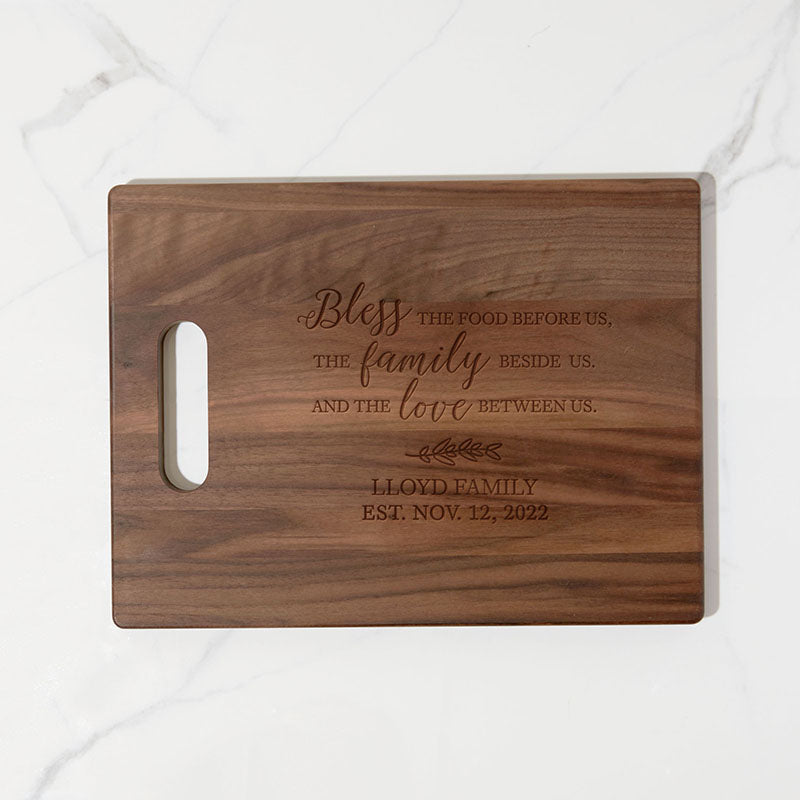 https://www.personalizedgallery.com/cdn/shop/products/engraved-walnut-cutting-board-Bless-Food_2048x.jpg?v=1648744788