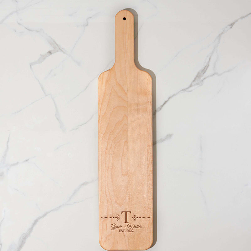 https://www.personalizedgallery.com/cdn/shop/products/maple-bread-board-INTIAL-DOTS-2_2048x.jpg?v=1648061922