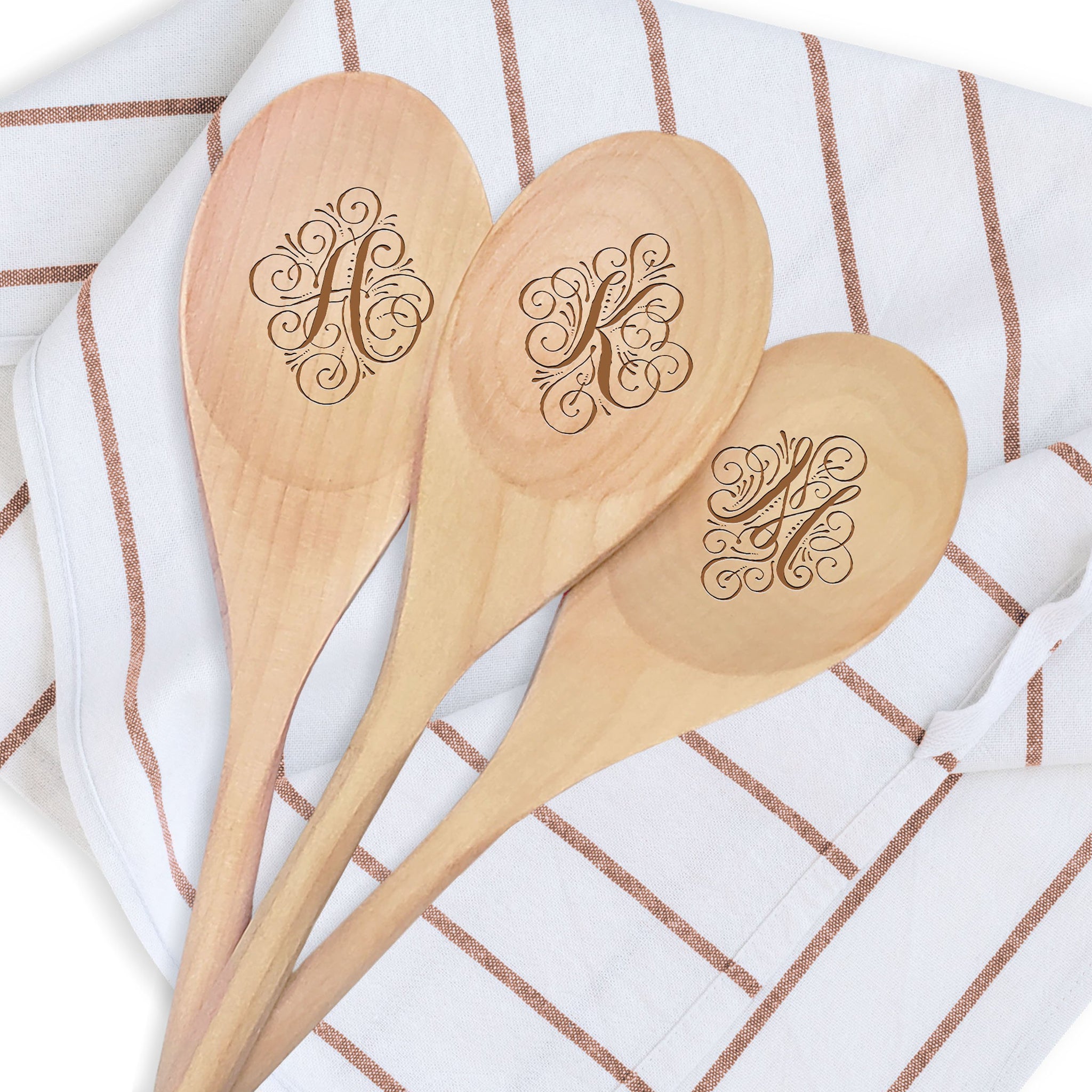 https://www.personalizedgallery.com/cdn/shop/products/monogram-spoon_2048x.jpg?v=1638914285